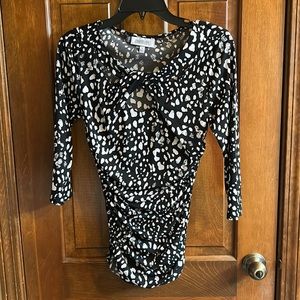 Sexy top with open area in neckline!